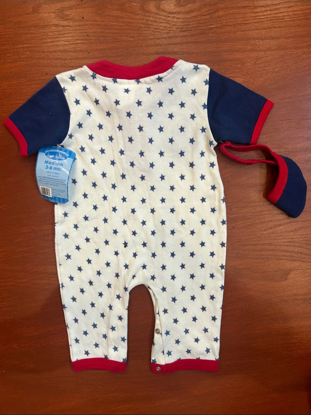 Bon Bebe Cream One-Piece with Navy Stars and Red Trim